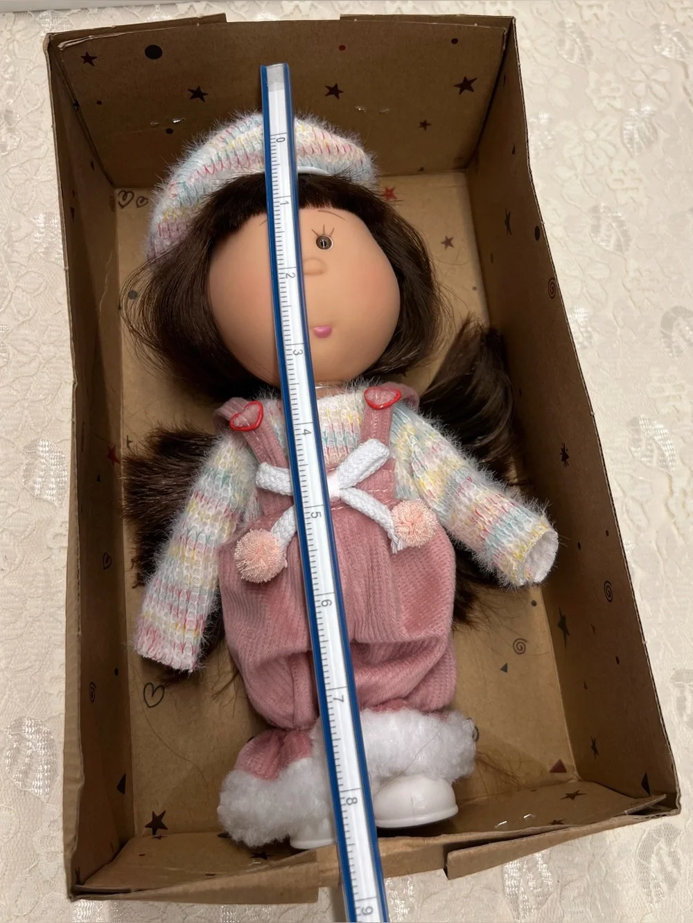 New, Mia Doll with Brown Hair Wearing a Pastel Sweater and Pink Overalls.